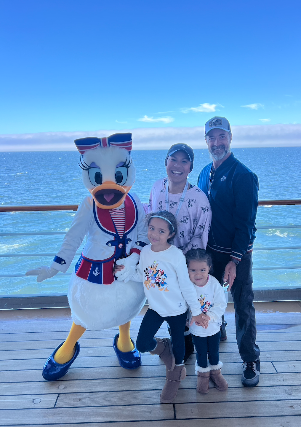 Family taking a picture at Castaway Cay